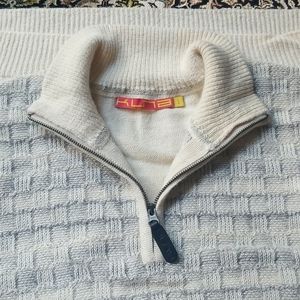 KUNA half kipper knit sweater.